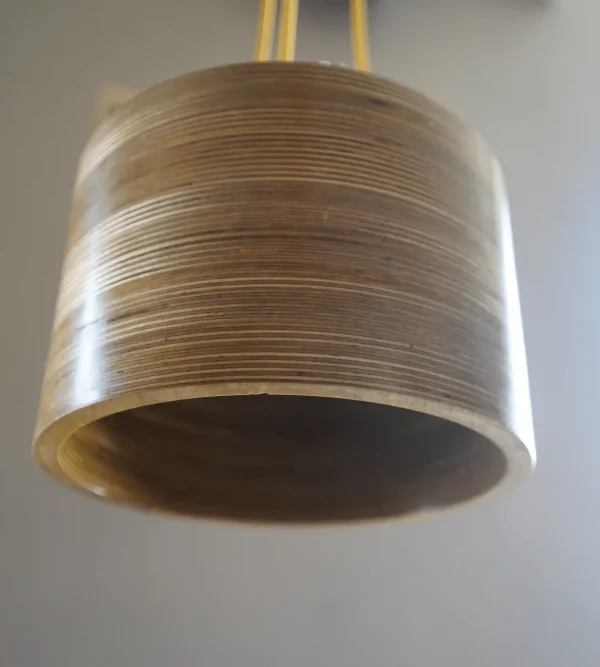 The elegance modern 3 Bulb Round Pendant Light with exposed plywood look & hanging from green fabric cable