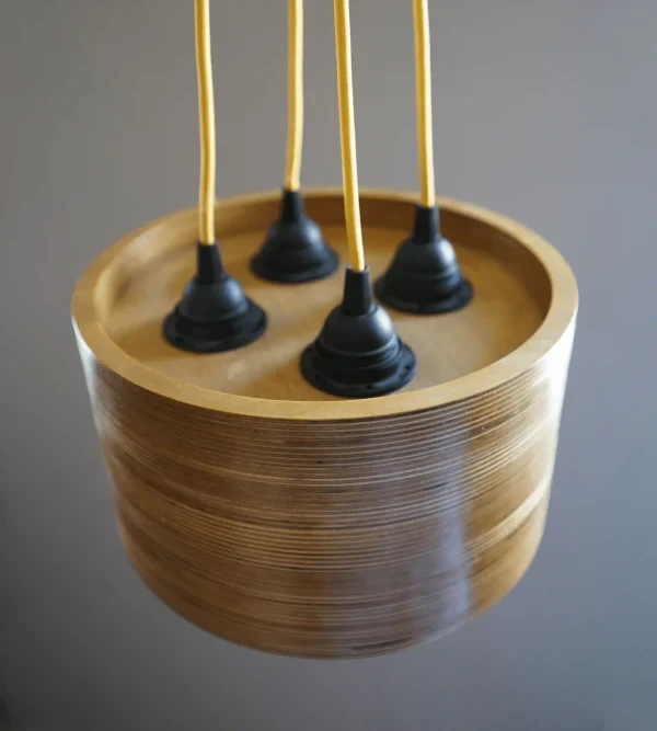 Modern 4 Bulb Round Pendant Light with exposed plywood look & hanging from green fabric cable