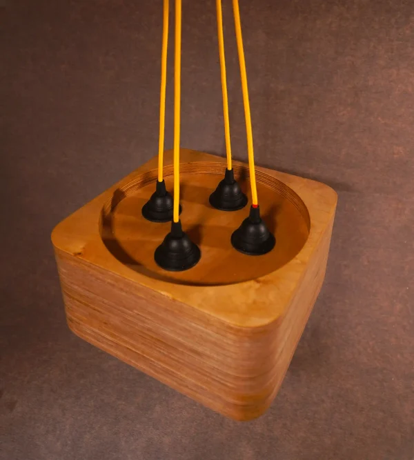 The elegance modern 4 Bulb Square Pendant Light with exposed plywood look & hanging from green fabric cable