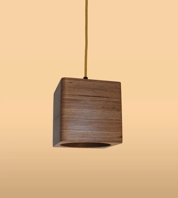 Geometric Single Bulb Square Pendant Light with exposed plywood look & hanging from mustard coloured fabric cable