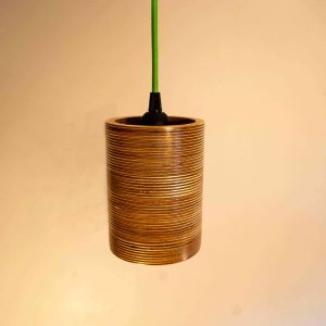 Single Bulb Round Pendant Light made of layered birch plywood with a smooth finish, suspended by a yellow fabric cable.