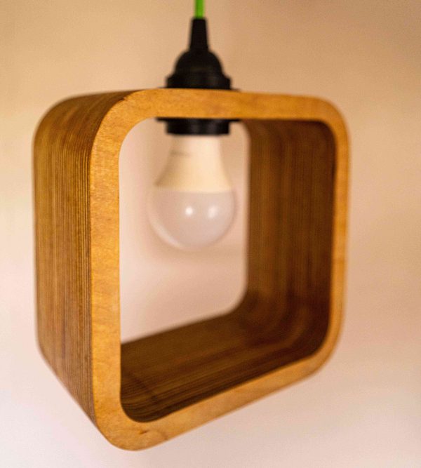 Contemporary Single Bulb Halo Pendant Light with exposed plywood look & hanging from green fabric cable